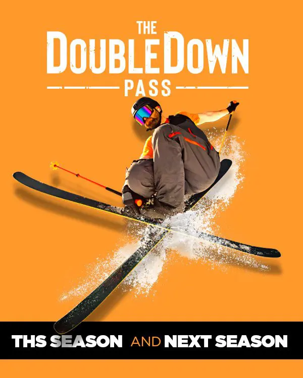 A skier in mid-air with snow spraying, wearing goggles and winter gear, set against an orange background. Text reads: "Ski Tahoe Double Down Pass. This season and next season. Mt. Rose Ski Tahoe