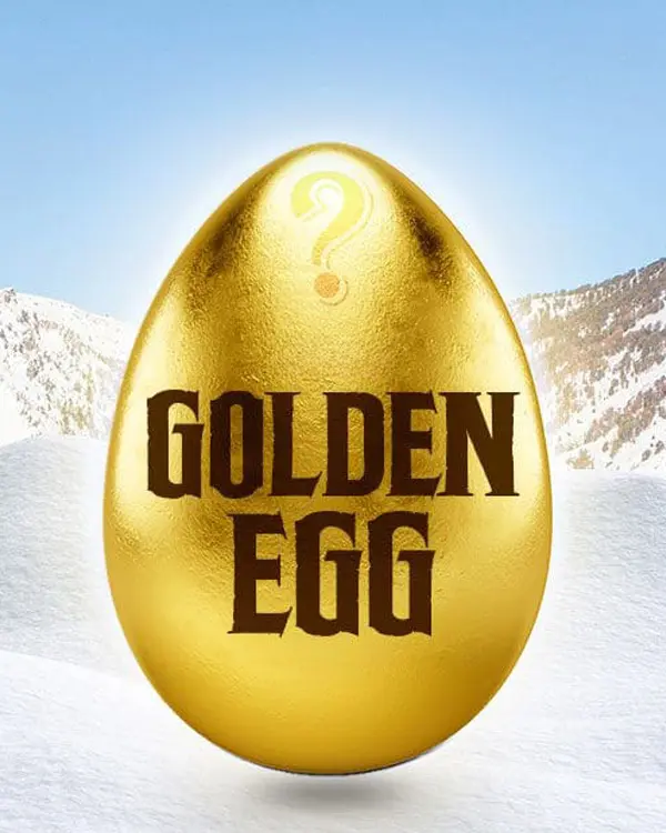 A shiny golden egg with the words "GOLDEN EGG" and a glowing question mark above it, set against a snowy mountain backdrop, capturing the thrill of Ski Tahoe under a clear sky. Mt. Rose Ski Tahoe