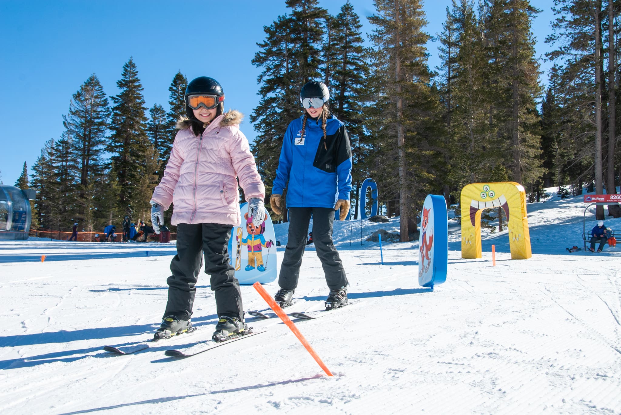 snowboarders riding groomed run near galena chair