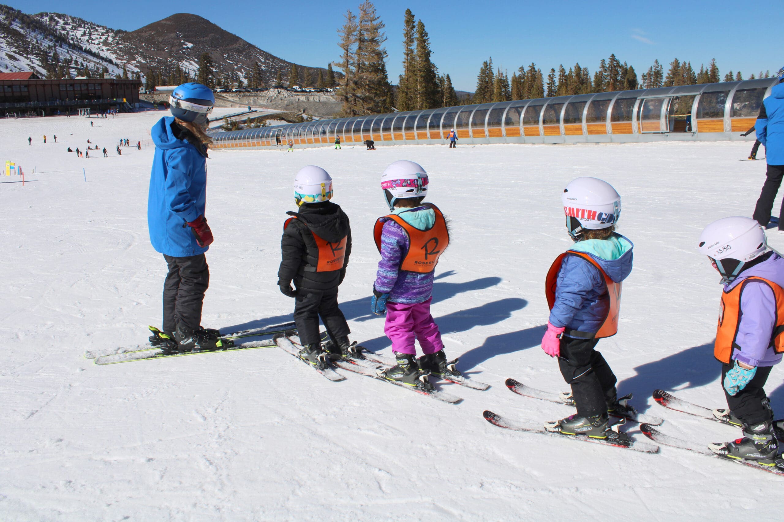 snowboarders riding groomed run near galena chair