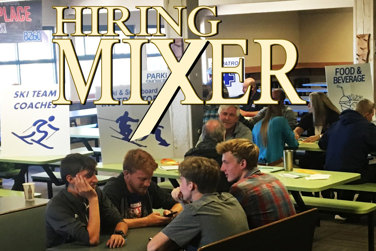 A group of people sits at tables in a cafeteria-style room, talking and networking. Large text reads “HIRING MIXER.” Signs for ski team coach, food & beverage, and parking patrol are visible in the background. Mt. Rose Ski Tahoe